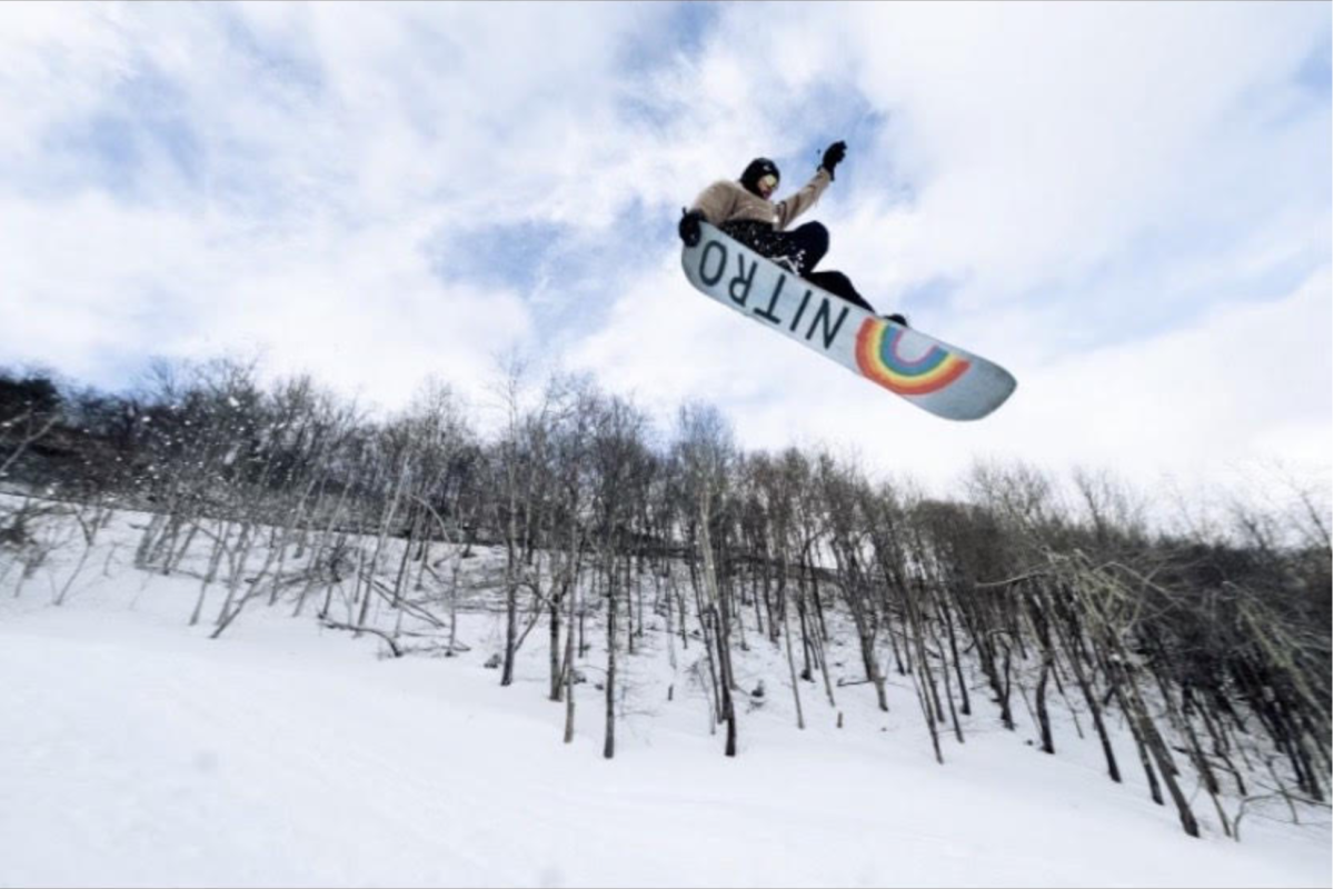 A snowboarder takes flight during an App State Snowboarding Team club meet.